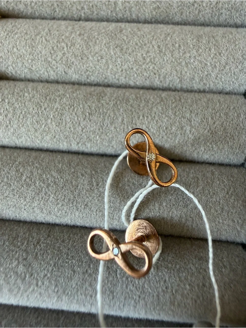 Gold plated sterling silver Infinity Stud Earrings with Sparkling Accent